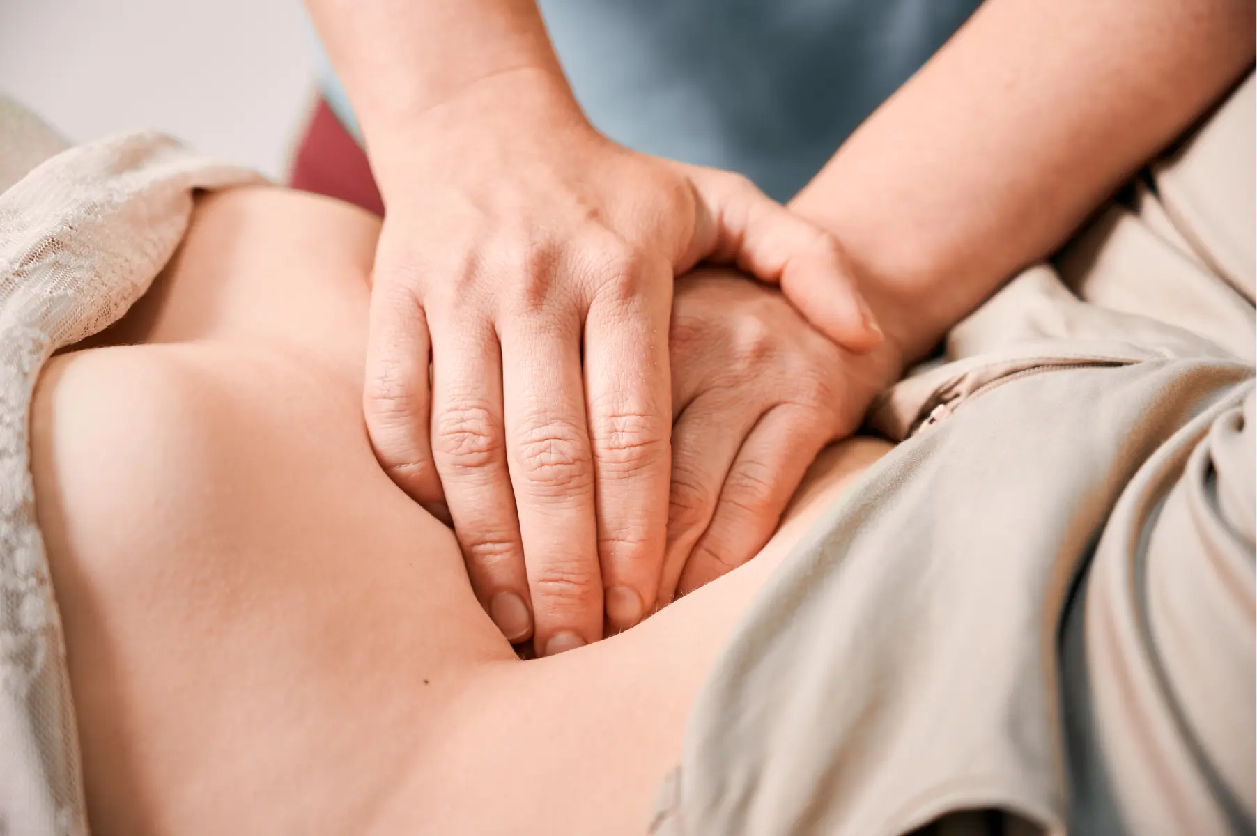 adult-receives-abdominal-massage-in-medical-settin-2026-03-17-02-23-59-utc