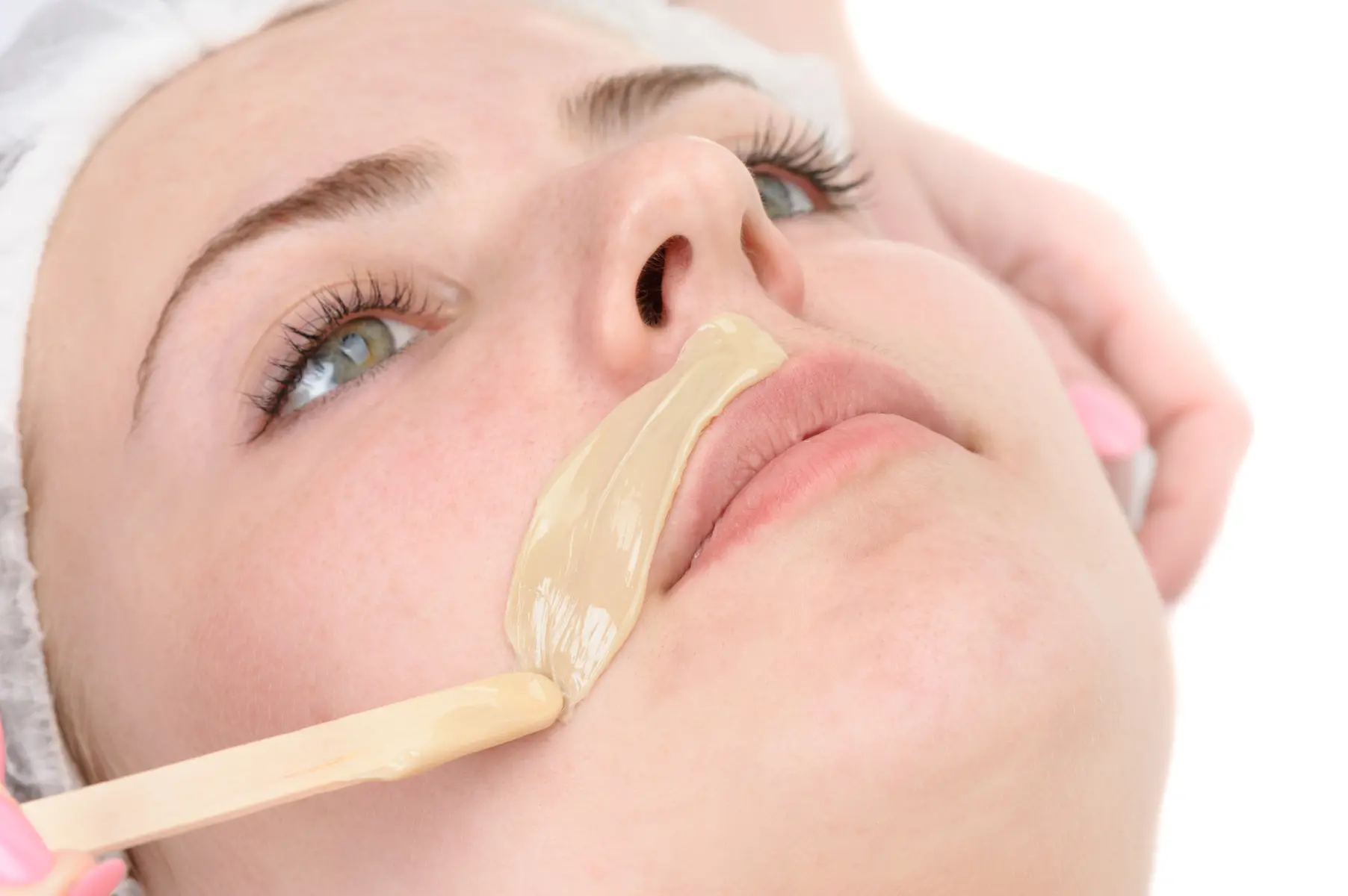 adult-woman-receiving-waxing-treatment-on-face-2026-03-09-08-57-35-utc