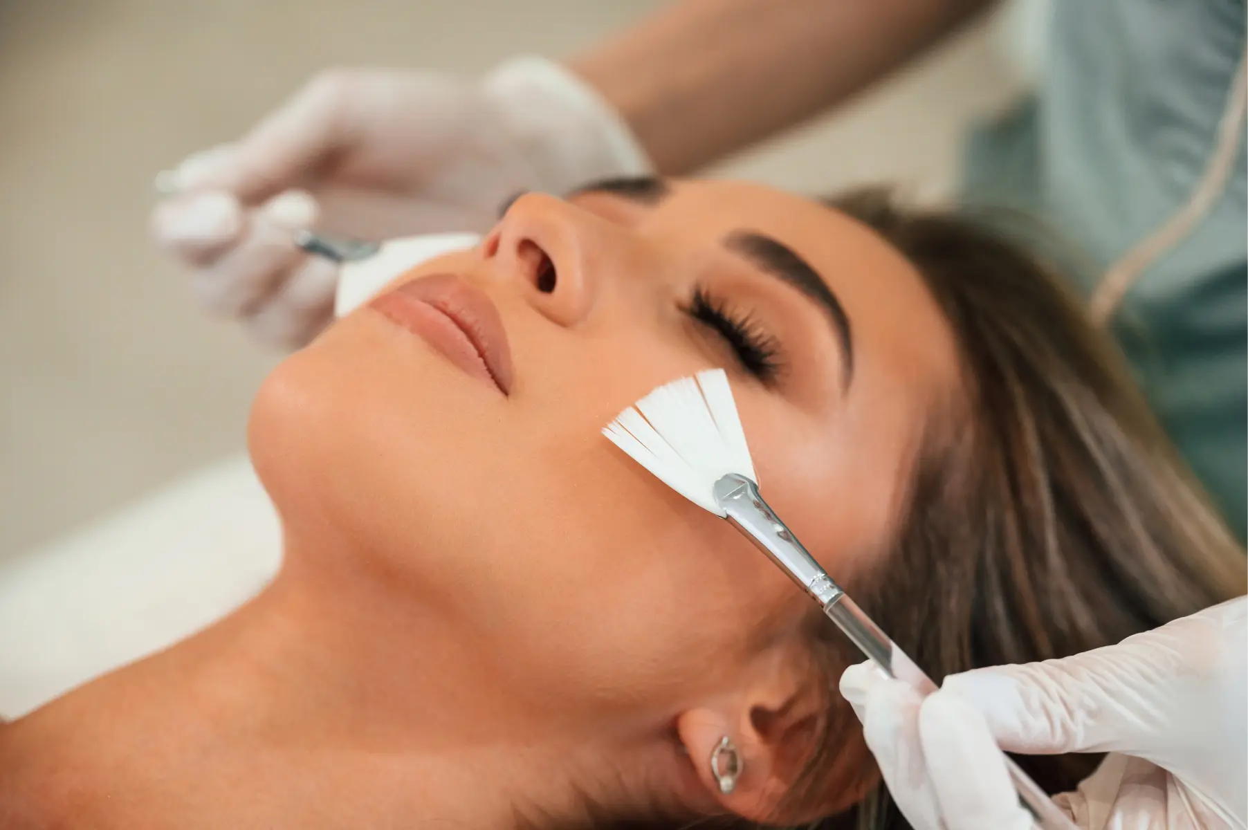 cleaning-skin-by-brushes-woman-face-getting-facia-2026-03-24-04-47-04-utc