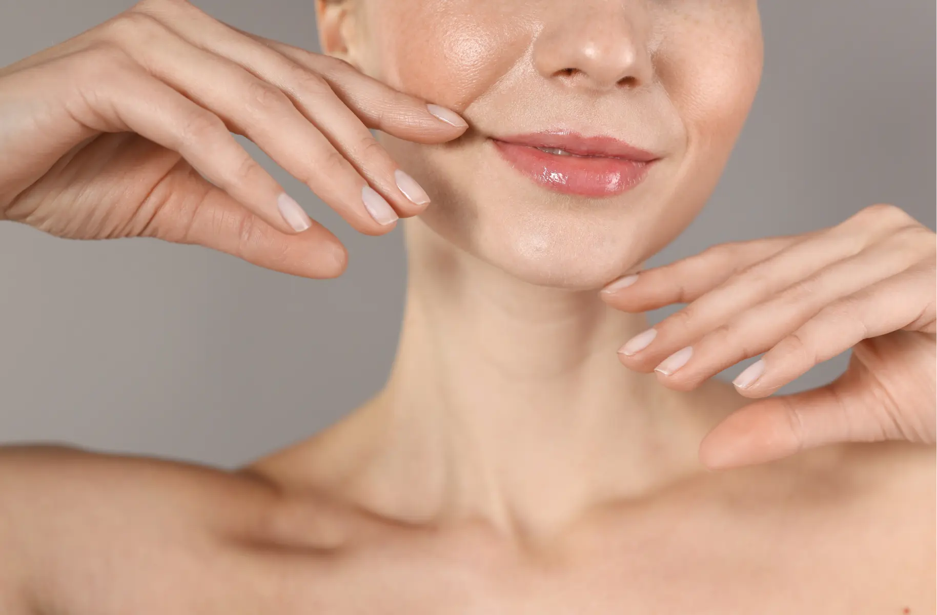 close-up-of-a-woman-touching-her-face-with-manicur-2026-05-14-17-29-25-utc