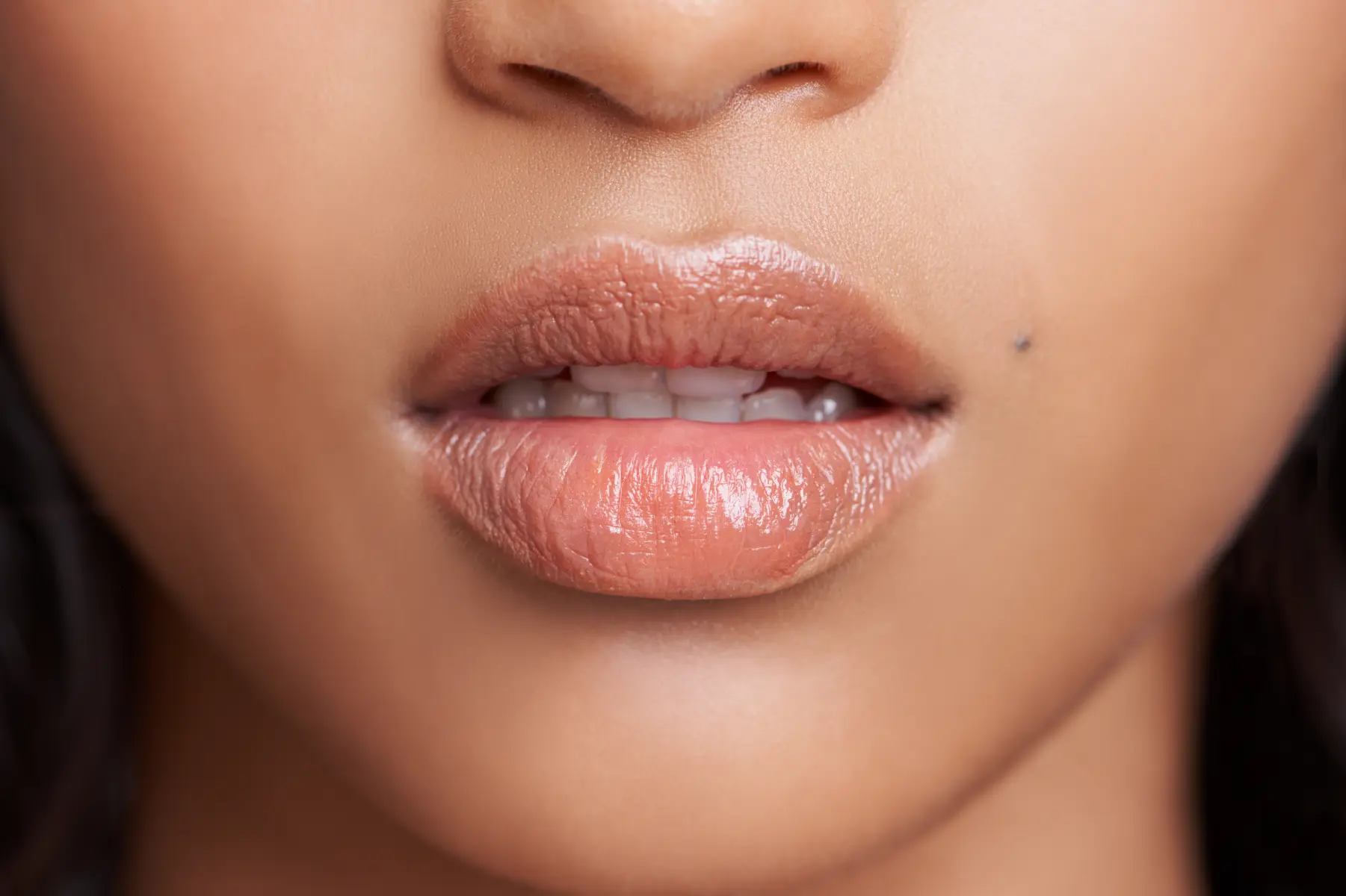 close-up-of-glossy-lips-on-woman-s-face-2026-03-25-02-15-12-utc