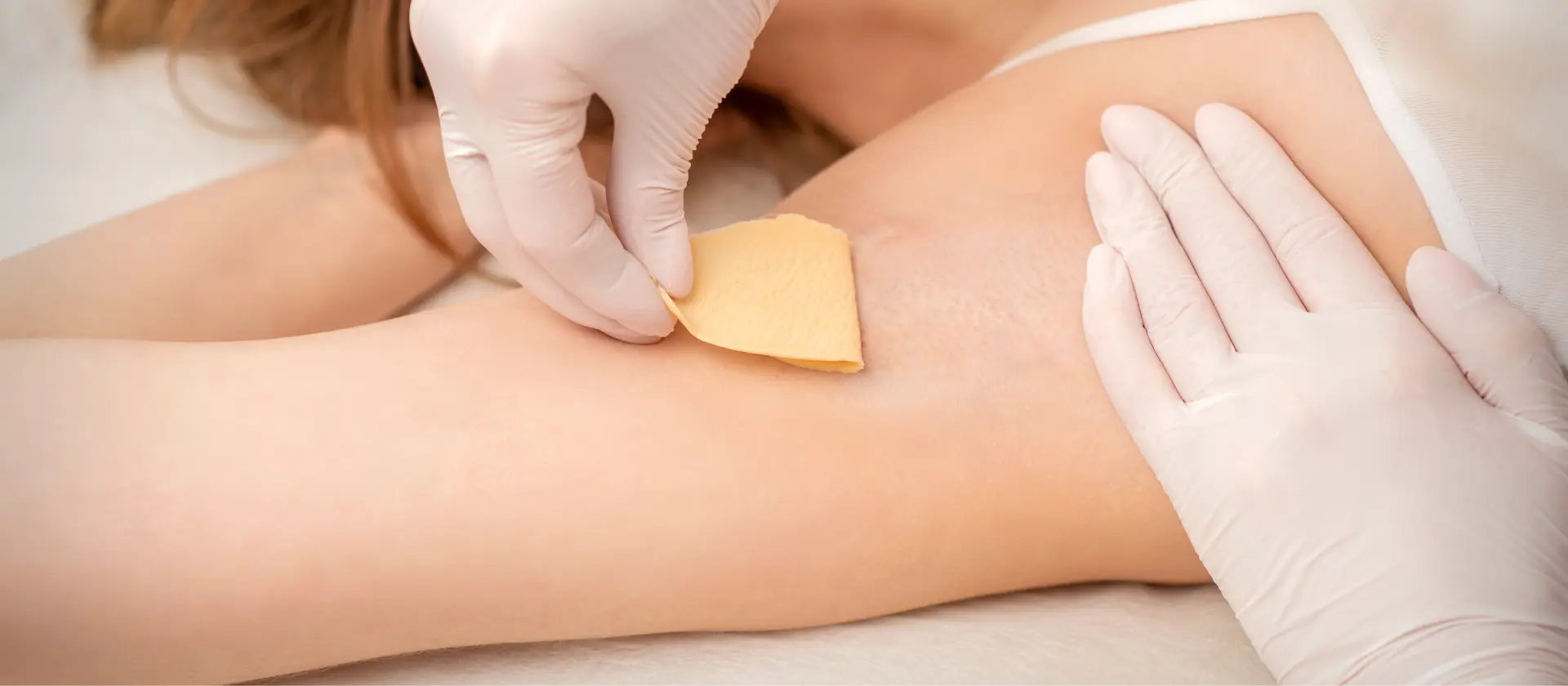 close-up-of-hands-in-gloves-of-beautician-waxing-y-2026-03-26-04-28-21-utc