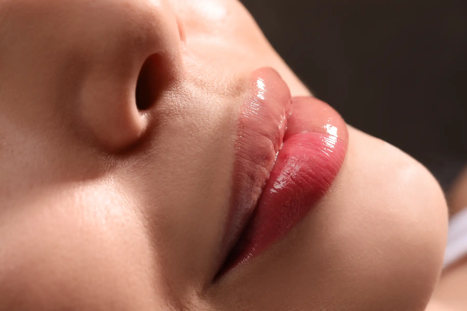 close-up-of-plump-lips-with-glossy-lipstick-2026-03-27-01-40-19-utc