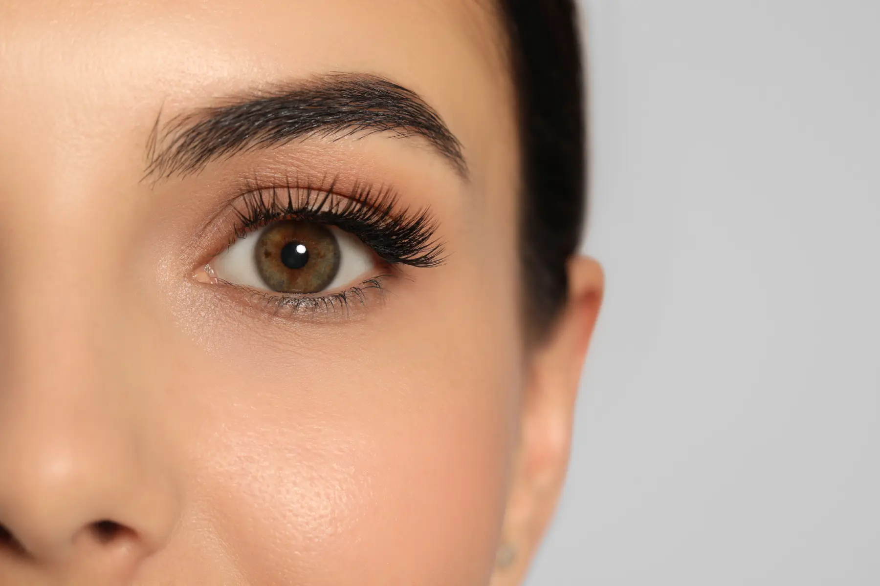 close-up-of-woman-s-eye-with-dark-hair-2026-03-27-02-05-01-utc