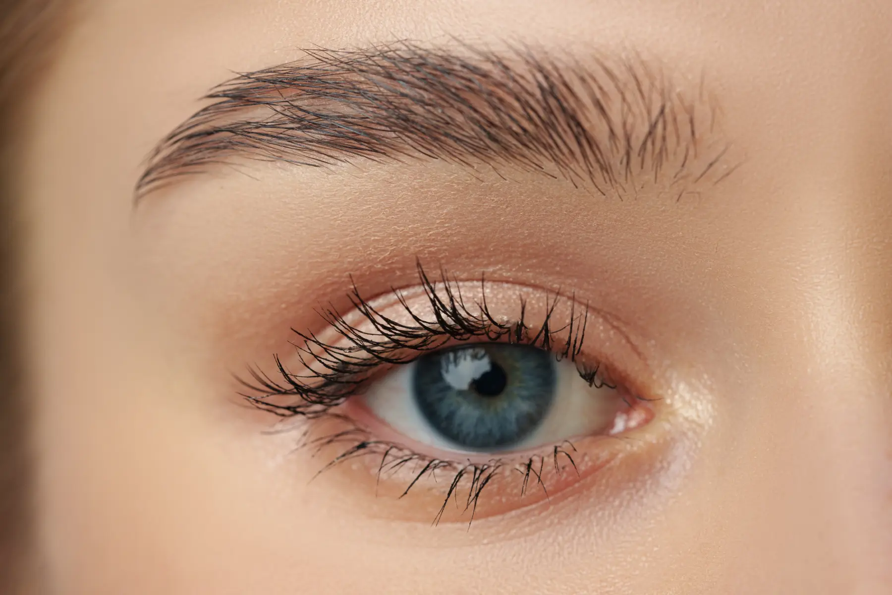 close-up-of-womans-face-with-blue-eyes-2026-01-08-22-46-35-utc (1)