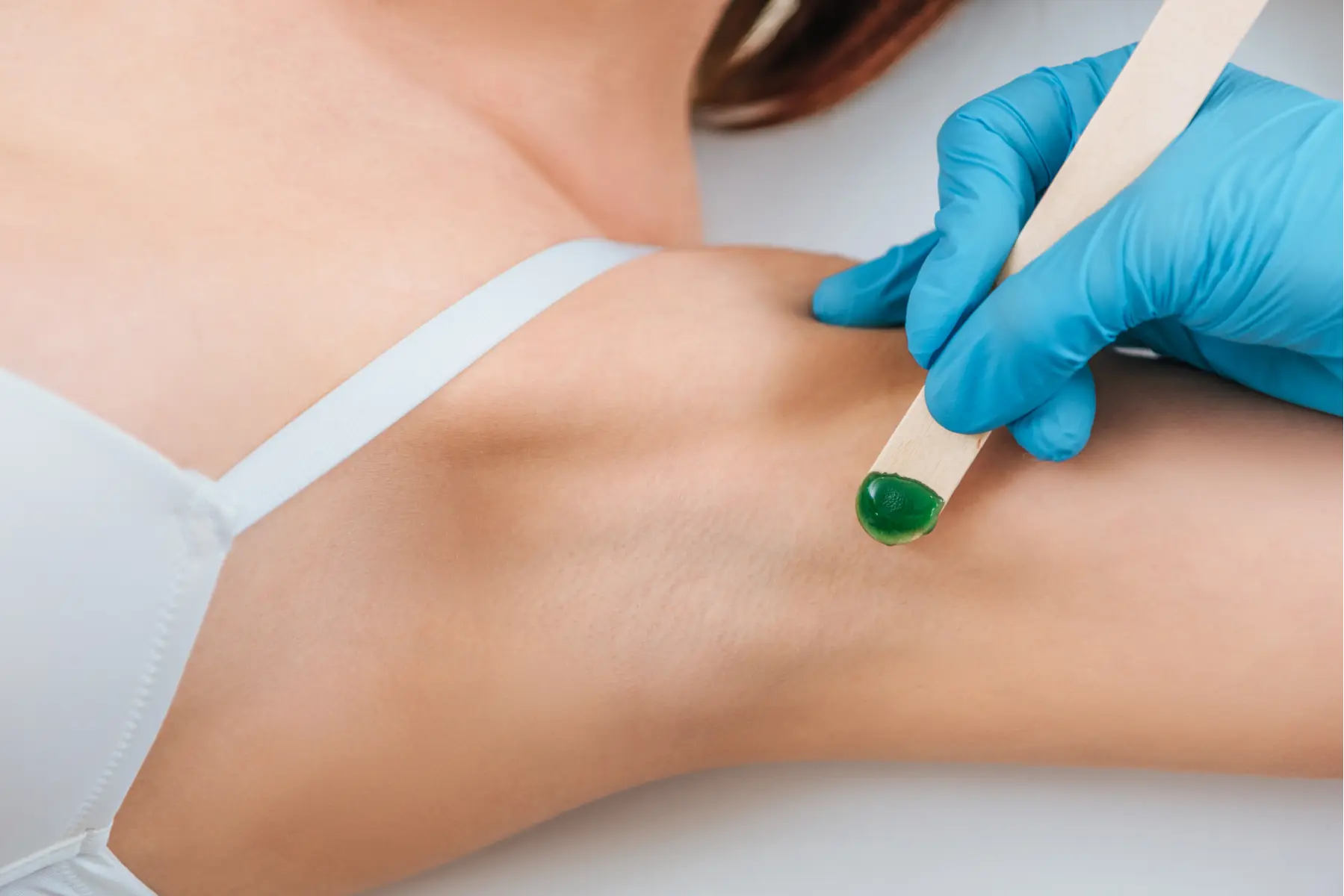 cropped-view-of-cosmetologist-using-putty-knife-fo-2026-03-13-01-15-54-utc