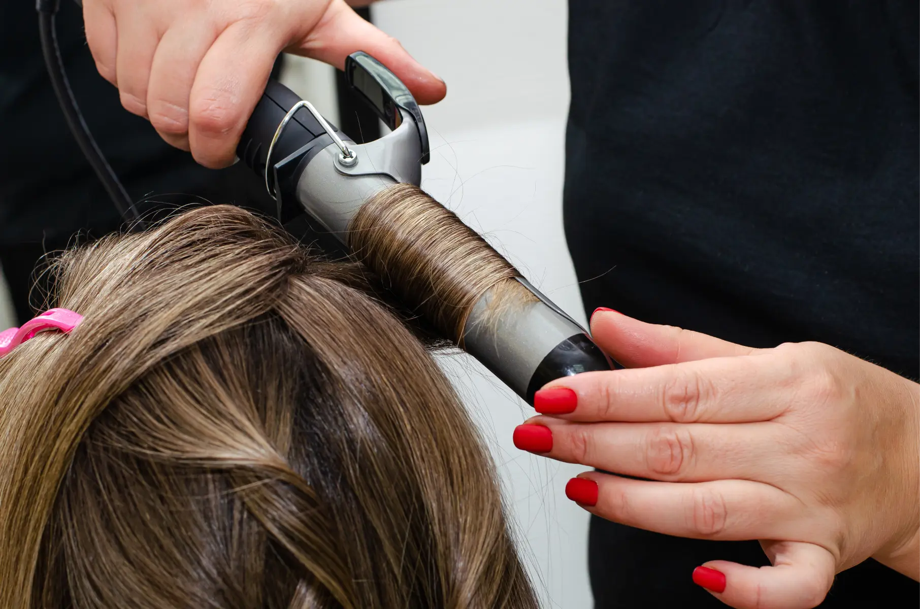 curling-iron-styling-blonde-hair-indoors-2026-03-16-00-35-21-utc