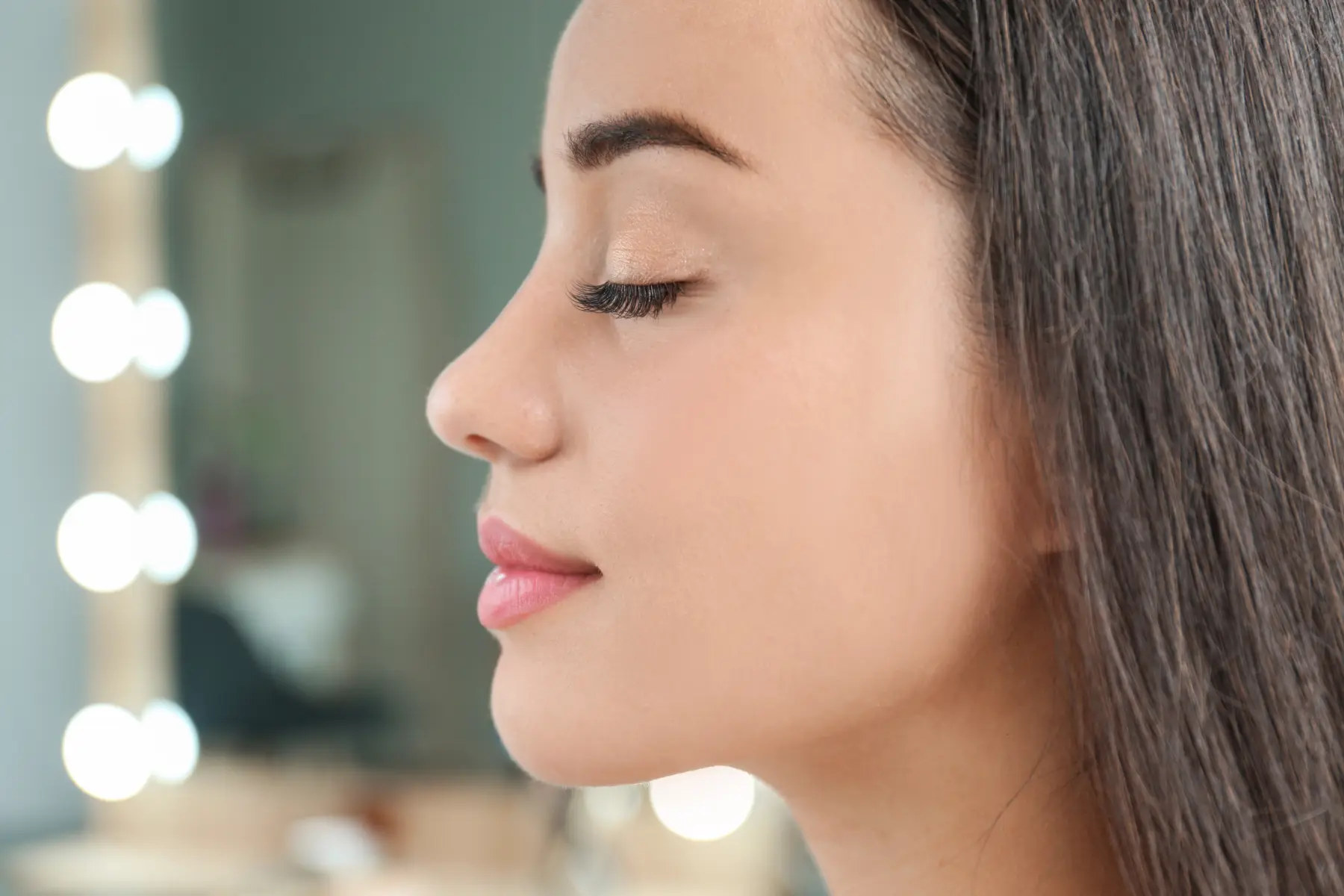elegant-woman-with-long-eyelashes-in-profile-2026-03-27-02-15-04-utc