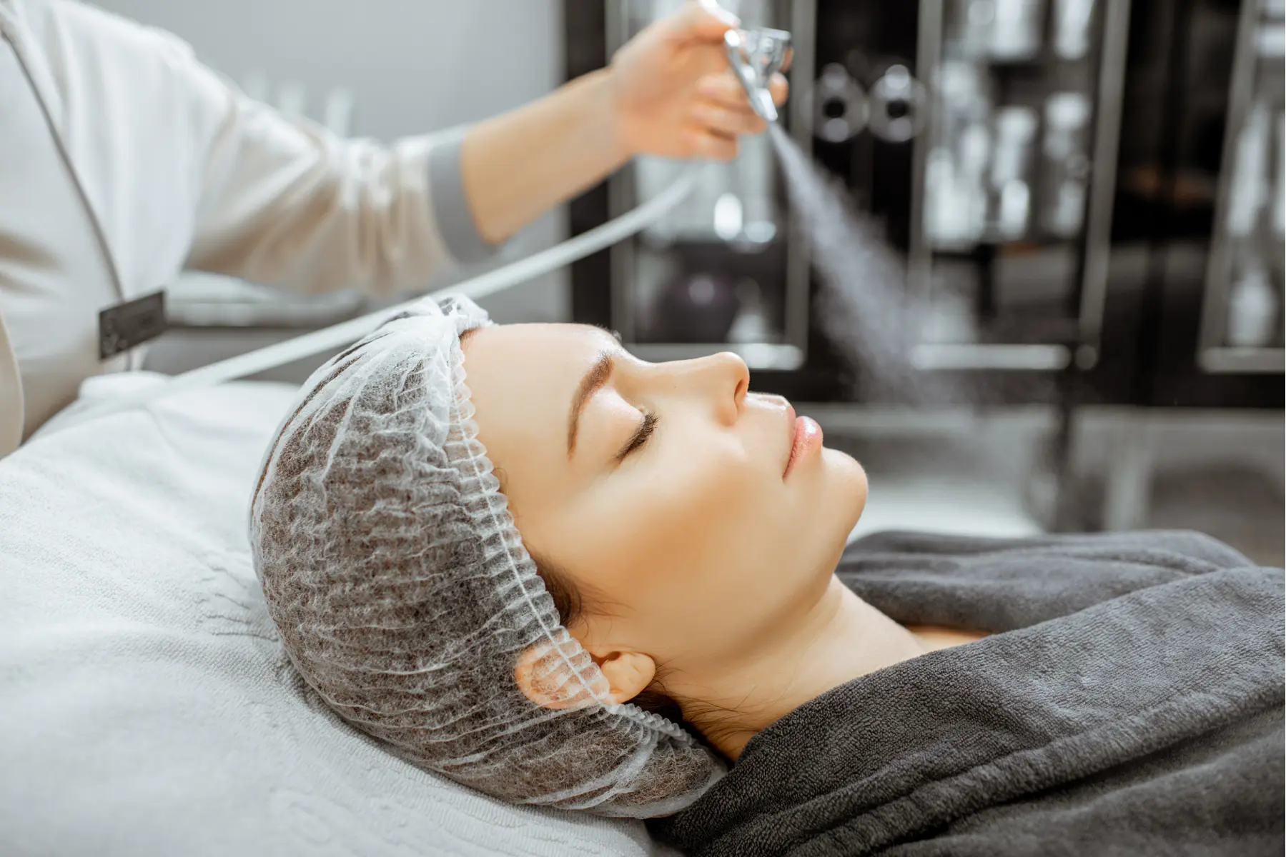 facial-treatment-with-atomizer-for-a-young-woman-2026-03-23-23-45-27-utc