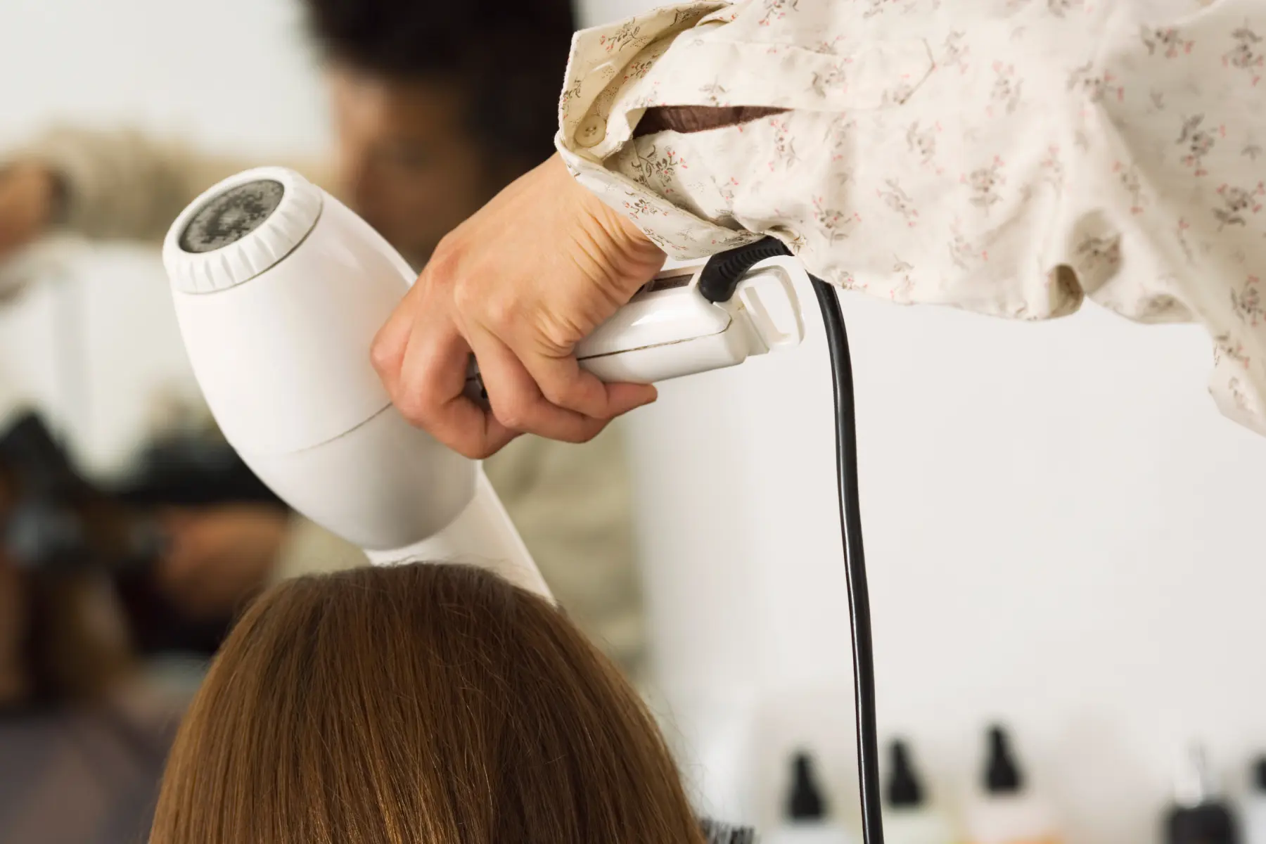 hair-styling-with-a-blow-dryer-in-salon-2026-03-26-04-41-17-utc