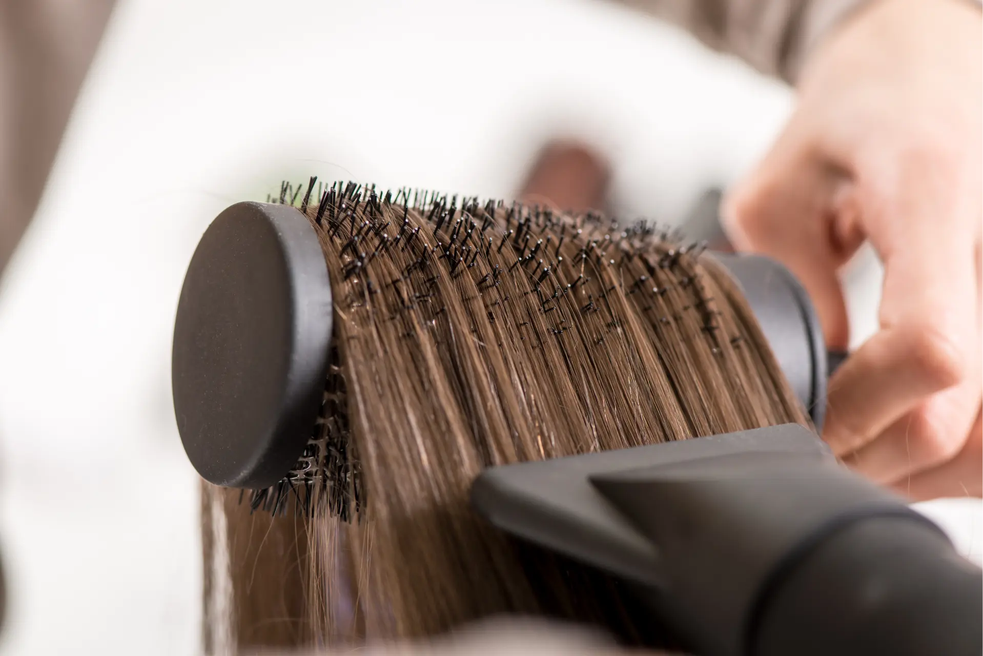 hair-styling-with-brush-and-blow-dryer-2026-01-05-06-09-33-utc