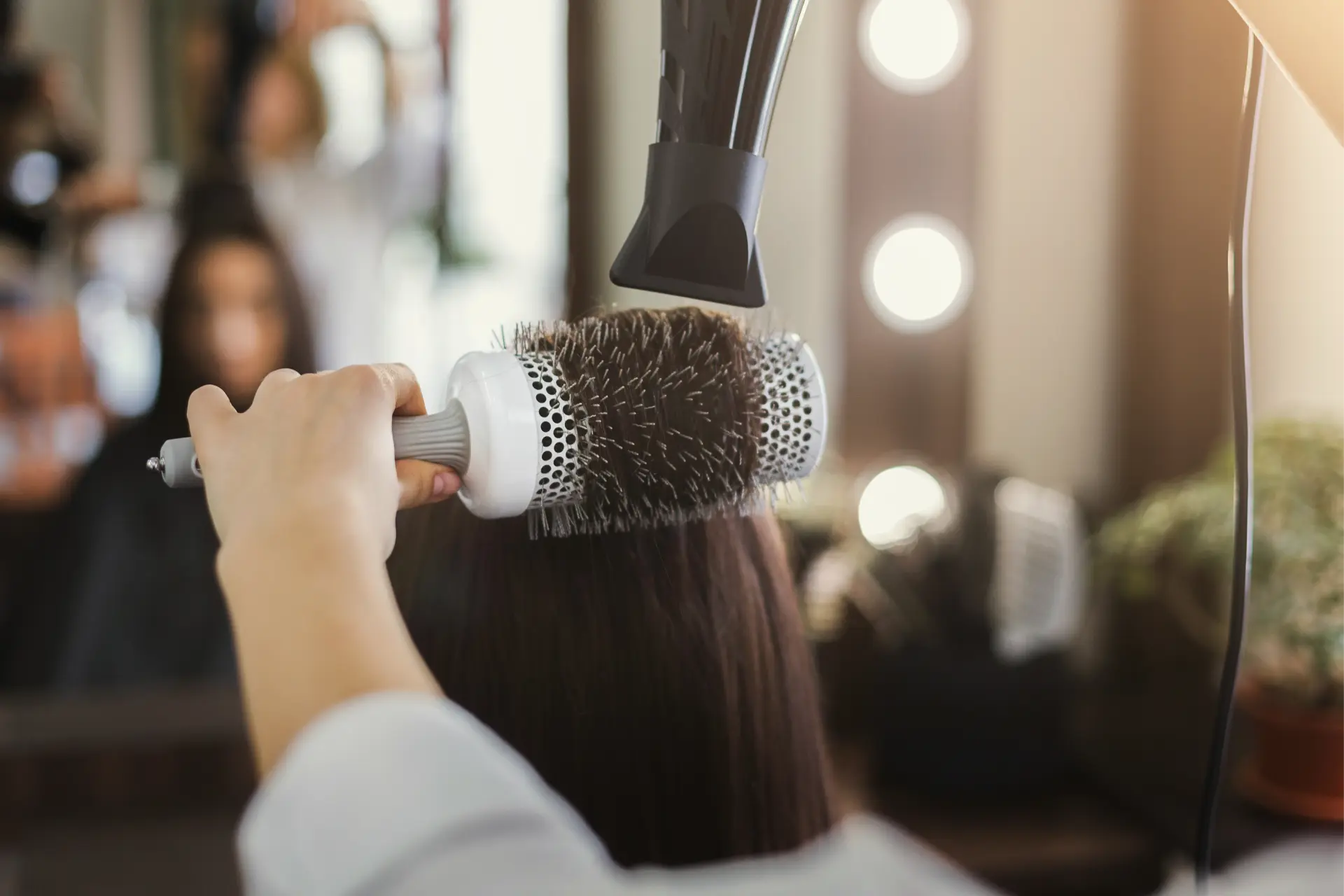 hair-styling-with-brush-and-blow-dryer-2026-03-24-01-31-02-utc