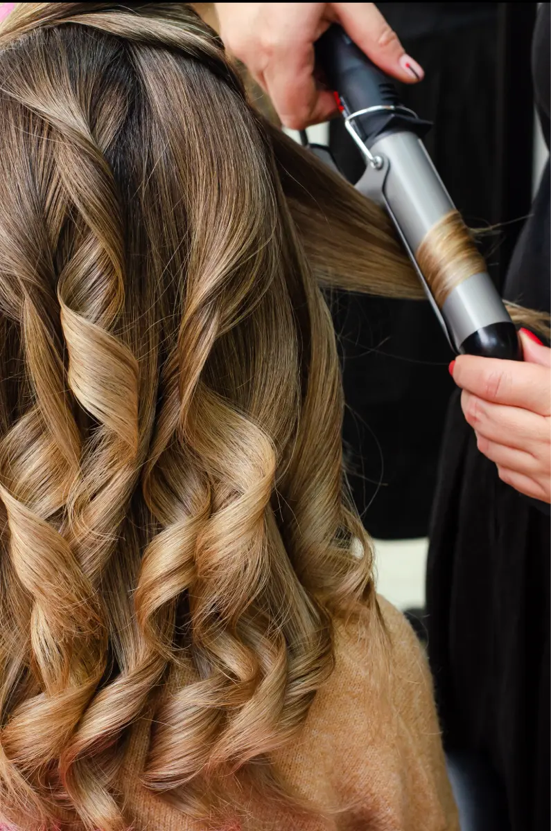 hair-styling-with-curling-iron-for-an-elegant-look-2026-03-17-05-07-11-utc