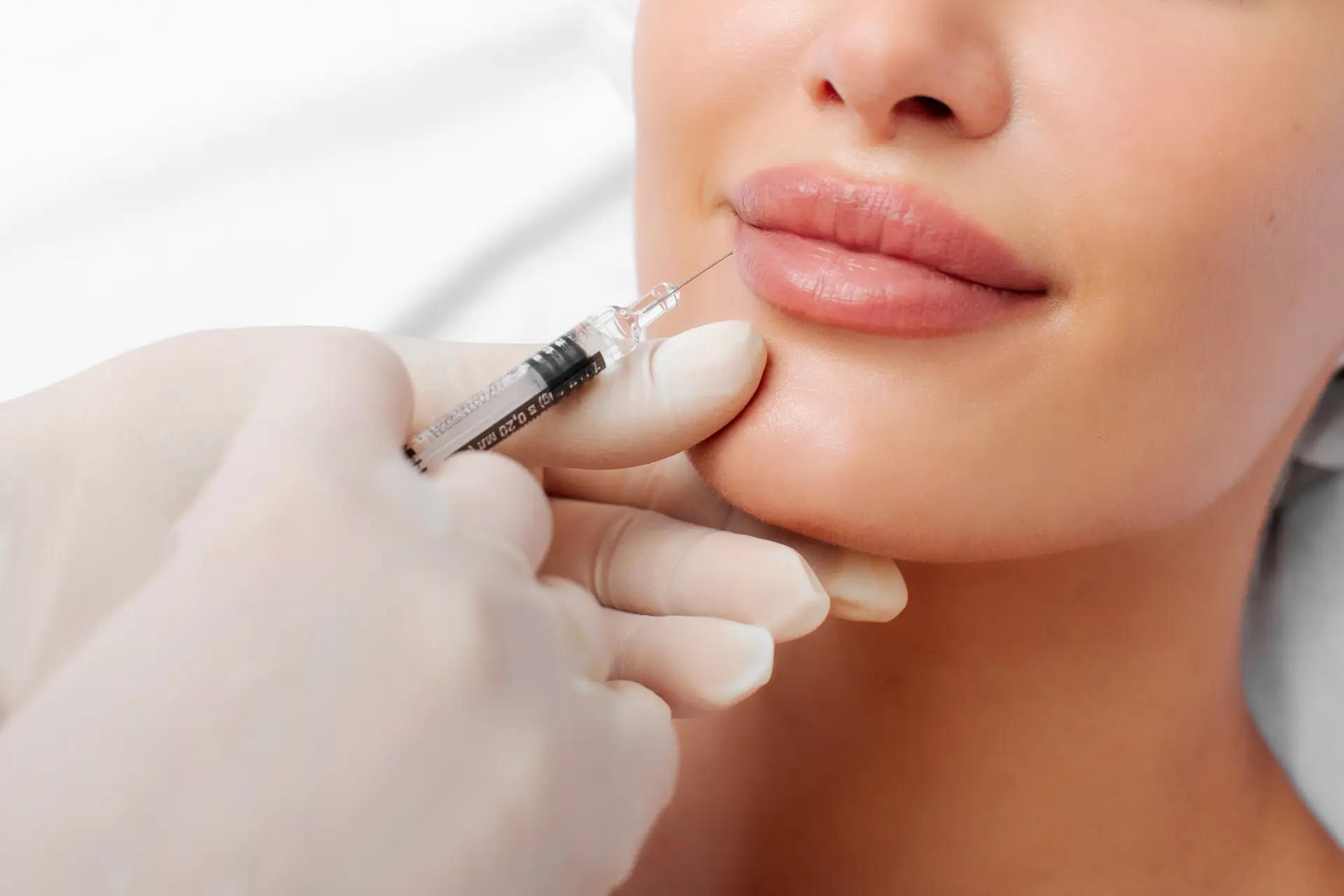 lip-shape-correction-procedure-cosmetologist-making-injection-lips-young-lady-patient-closeup-shot-lip-augmentation-concept