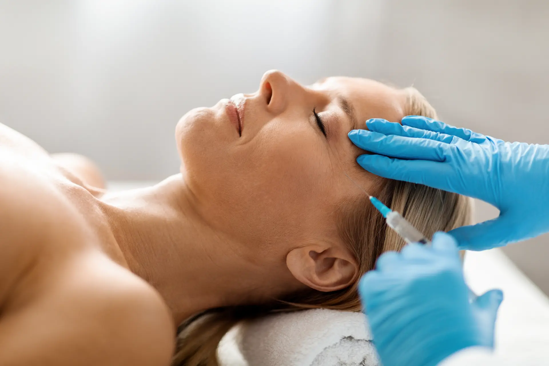mesotherapy-concept-cosmetologist-doctor-doing-facial-rejuvenation-injection-middle-aged-woman