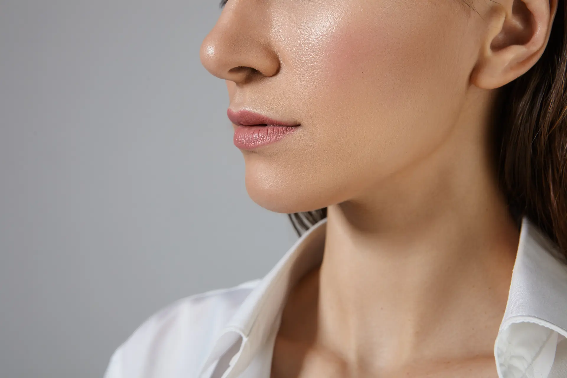 people-femininity-beauty-style-fashion-concept-cropped-picture-unknown-woman-with-shiny-skin-pink-lips-posing-against-blank-copyspace-wall-dressed-white-silk-formal-shirt (2)
