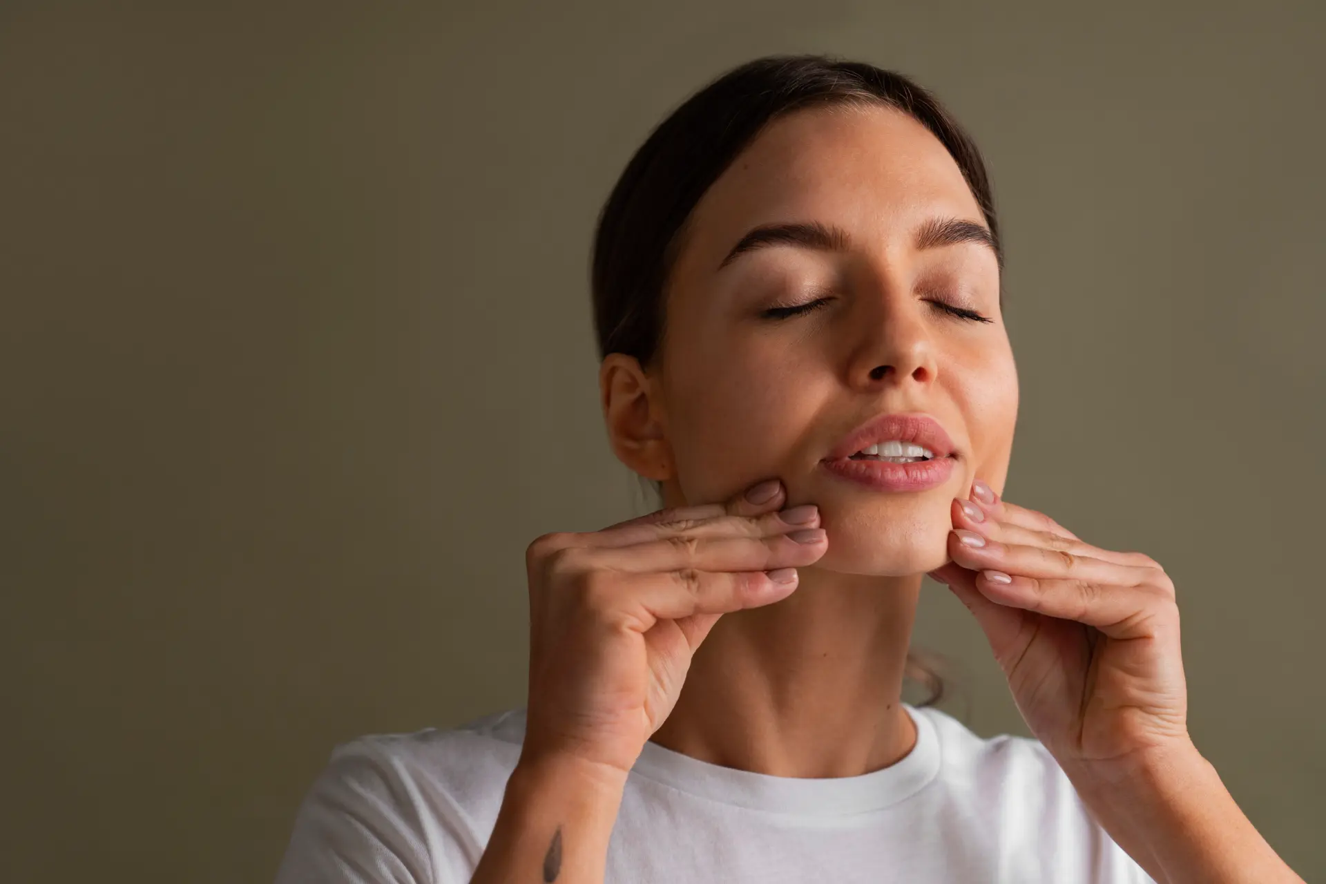 portrait-young-woman-practicing-facial-yoga-youth (3)
