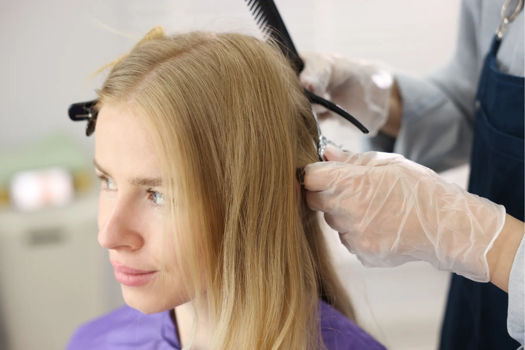 professional-hair-stylist-dyeing-blonde-hair-of-a-2026-07-20-23-08-52-utc