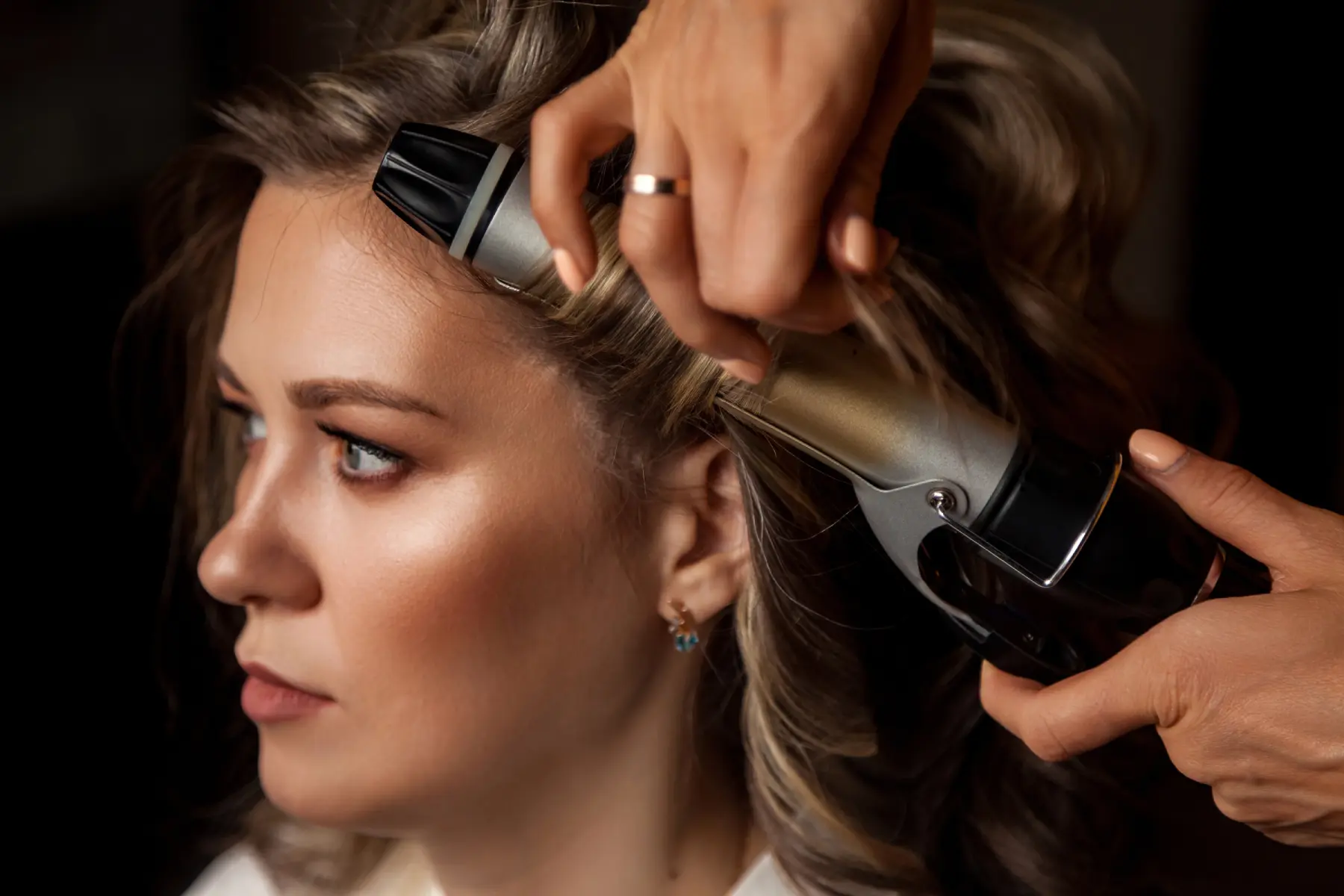 woman-getting-hairstyle-in-preparation-for-event-2026-03-25-09-20-52-utc