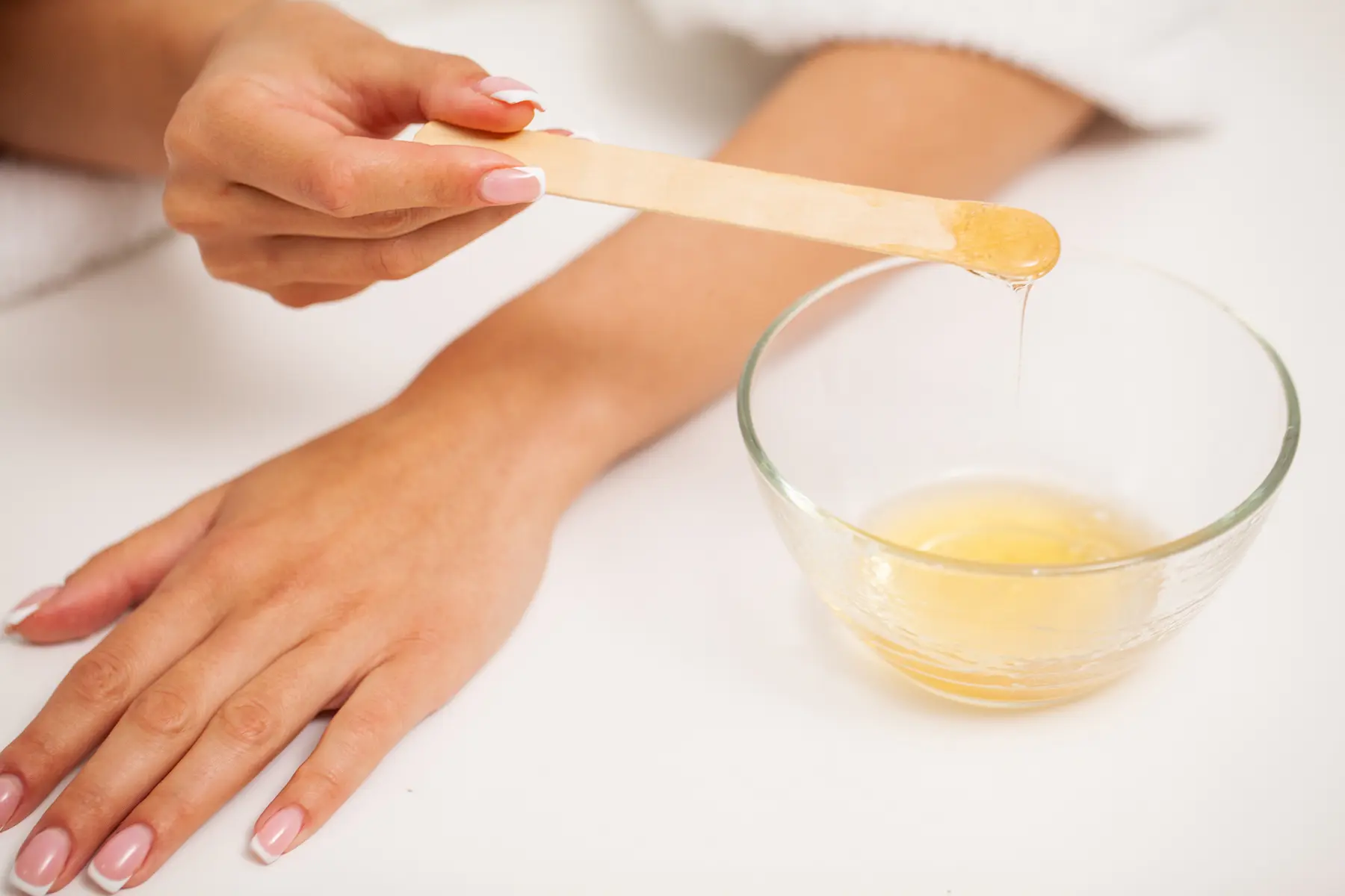 woman-prepares-soft-wax-for-skin-treatment-2026-03-19-09-01-17-utc