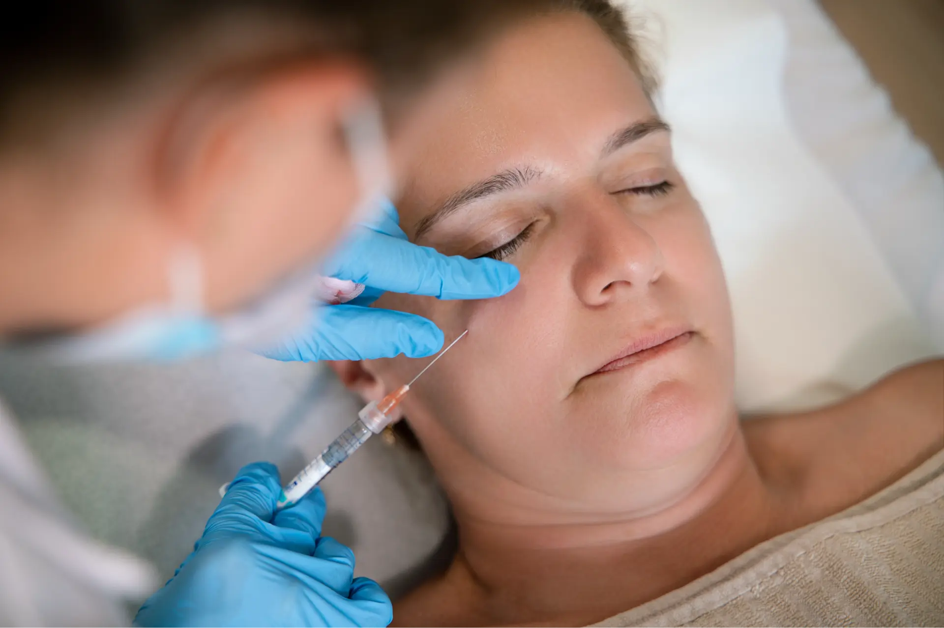 woman-receives-cosmetic-injection-in-clinic-2026-03-17-05-02-19-utc