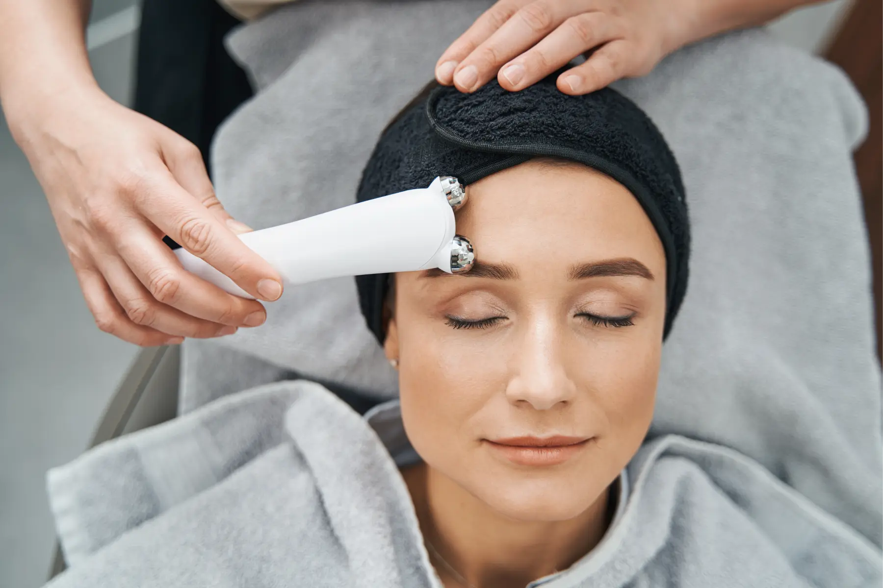 woman-receives-facial-massage-at-modern-spa-2026-03-10-02-10-38-utc
