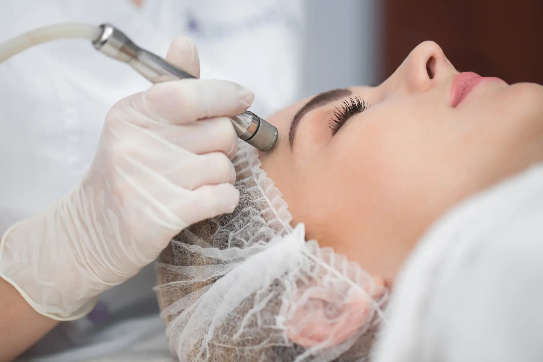 woman-receiving-facial-treatment-at-beauty-clinic-2026-03-17-03-56-25-utc