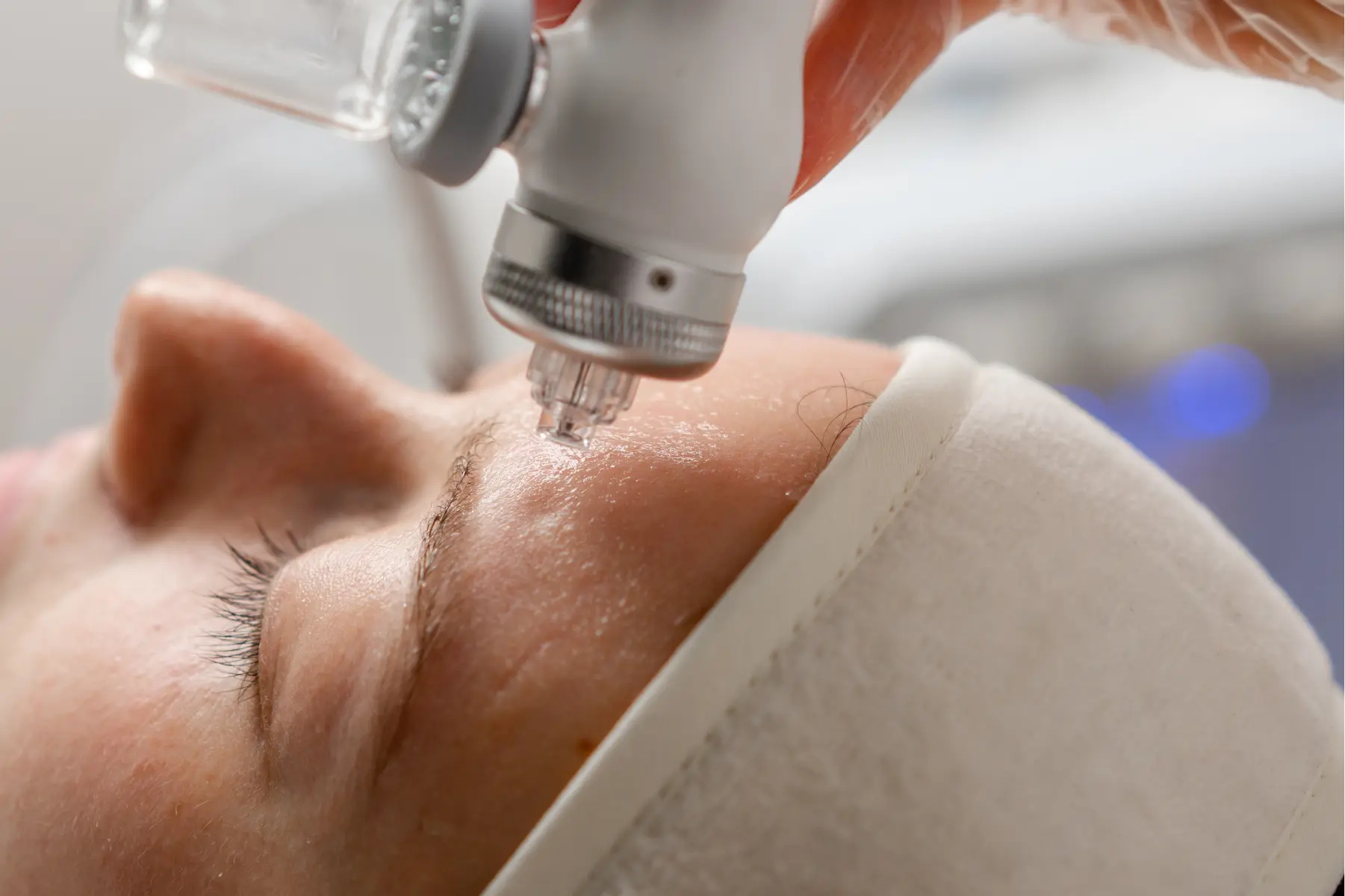 woman-receiving-facial-treatment-in-beauty-clinic-2026-03-13-04-12-40-utc