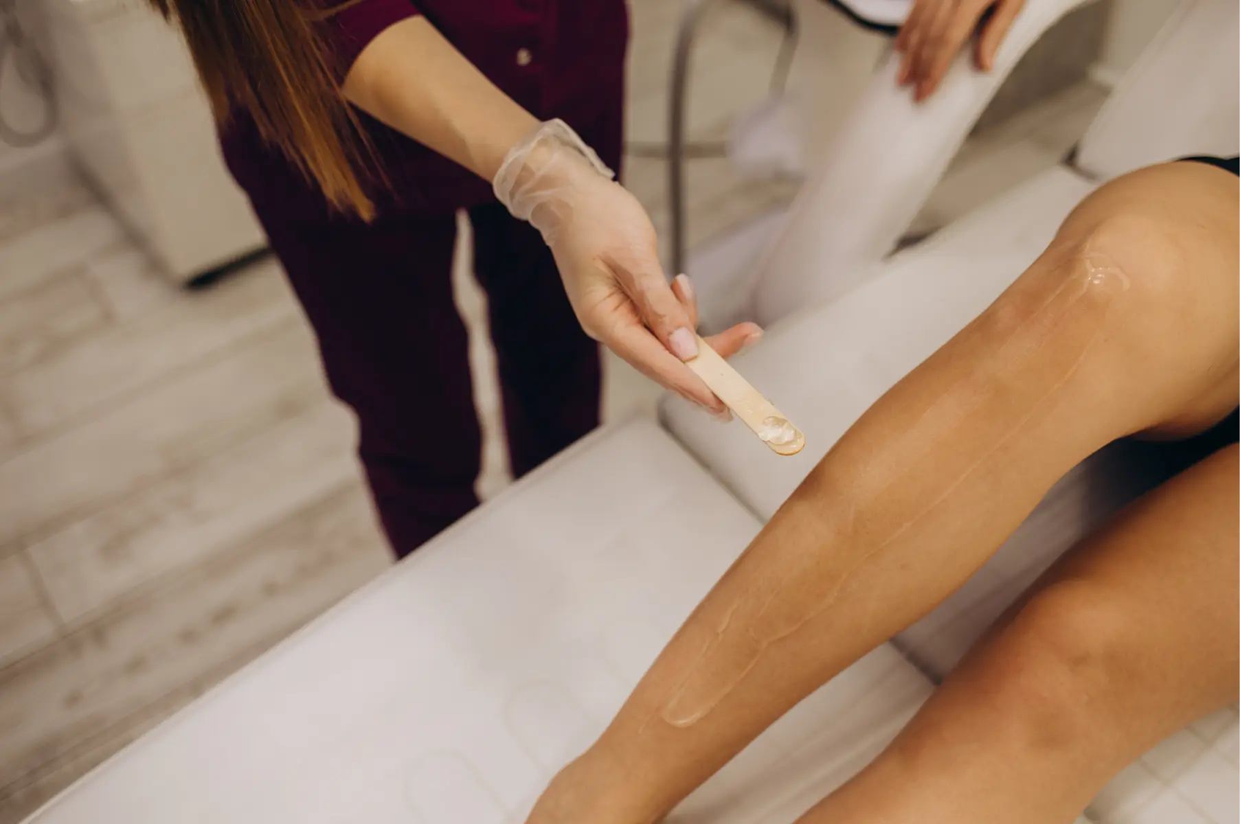 woman-receiving-leg-waxing-treatment-in-spa-2026-01-08-22-51-06-utc