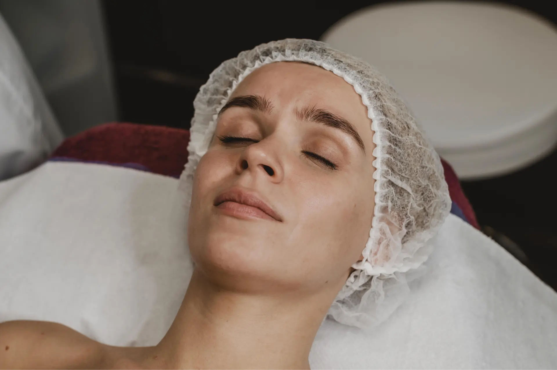 young-woman-getting-cosmetic-treatment-spa